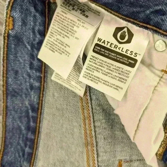 Levi Strauss & Co high waisted 5 button Denim Distressed Mini Skirt Size 27 mini - Picture 8 of 8